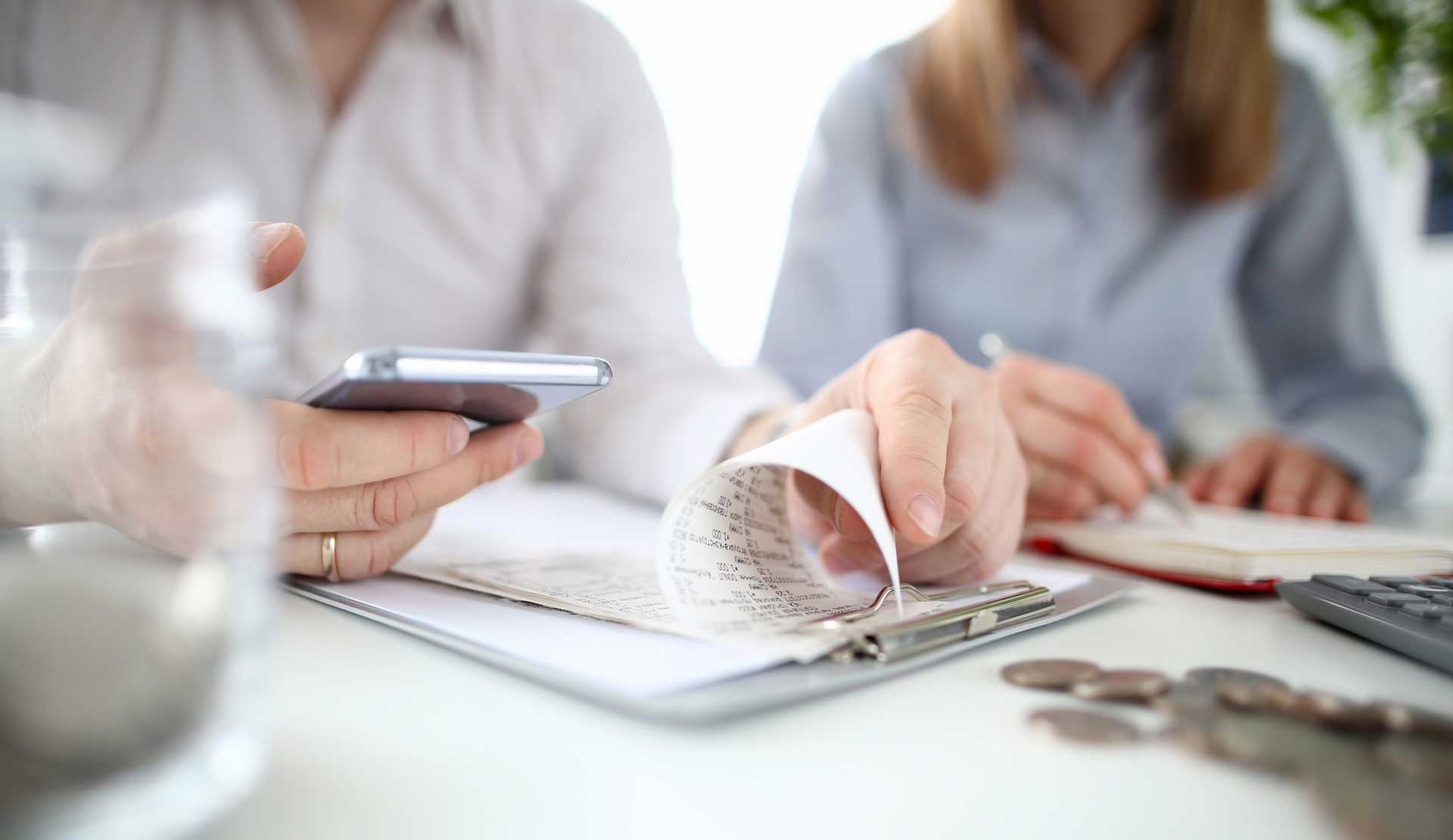 couple checking papers